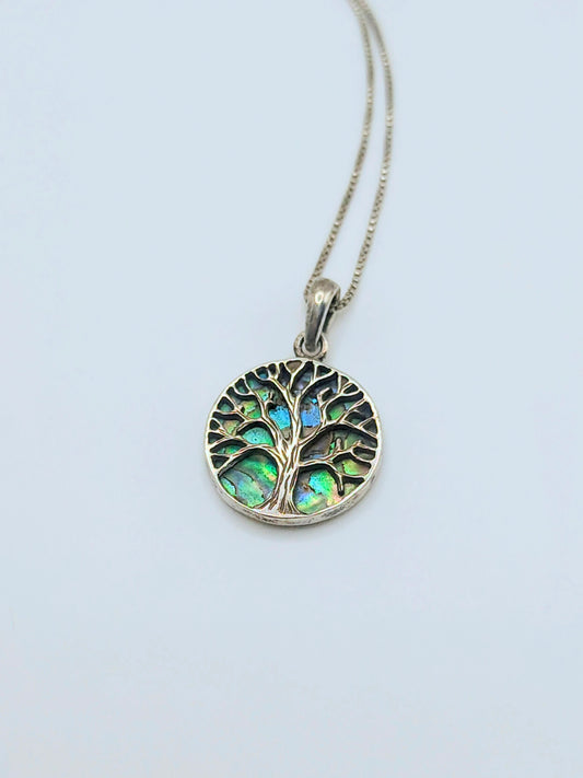 Sterling silver Tree of Life pendant with iridescent green and blue abalone shell inlay, with a delicate silver box chain.